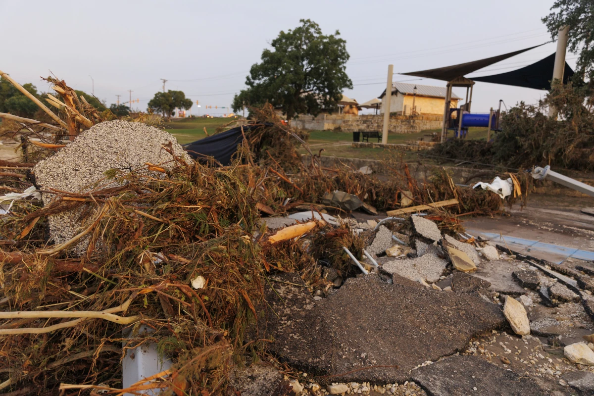 Debris is seen in the Guadalupe River in Kerrville, Texas, on Sunday.