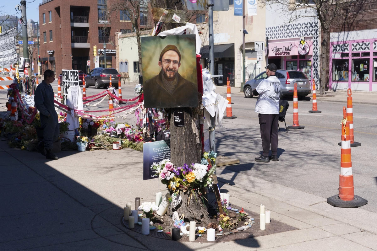 Mourners visit the memorial site for Alex Pretti, who was shot and killed by federal agents in January during Operation Metro Surge, in Minneapolis, Minn. on April 24, 2026.