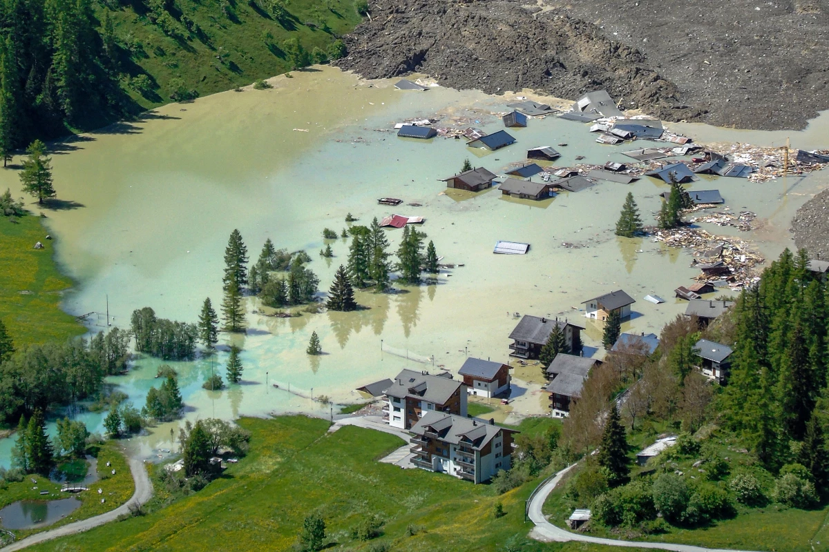The village of Blatten, in a valley below the Bietschhorn mountain in the Swiss Alps, was destroyed Wednesday by a landslide after part of the huge Birch Glacier collapsed. A local river is now blocked and forming a lake that is flooding buildings that remain, authorities said.