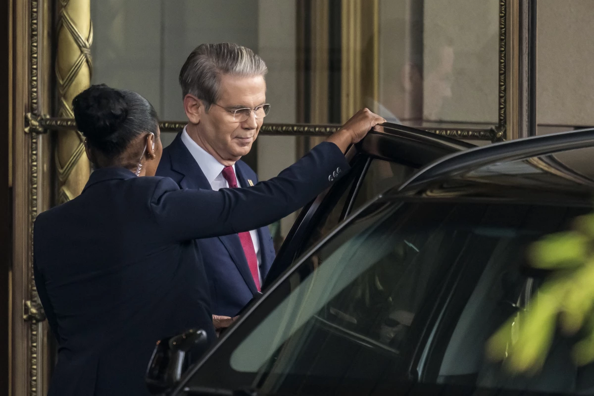 U.S. Treasury Secretary Scott Bessent leaves his hotel to attend a meeting with China's officials on tariffs in Geneva, on Saturday.
