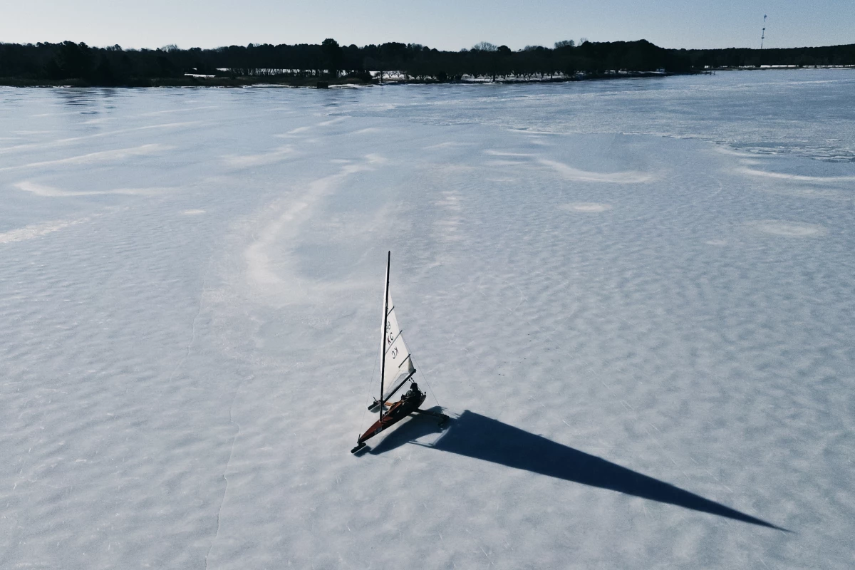 The spectacle of ice boats gliding across sheer ice at speeds of more than 50 miles an hour drew hundreds of onlookers to Claiborne Cove recently.