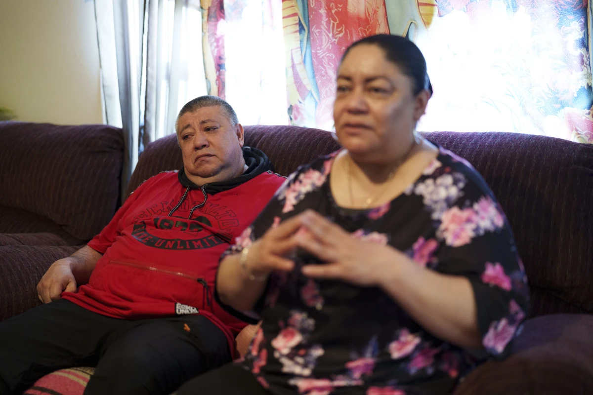 Pablo Alcaraz becomes emotional as he and his wife Maria Peñalosa discuss the closure of their restaurant at their home in Inver Grove Heights, MN on April 22, 2026. The couple, who had to close Garibaldi Mexican Restaurant in West St. Paul after suffering dramatic revenue losses during Operation Metro Surge, have lost their only source of income.