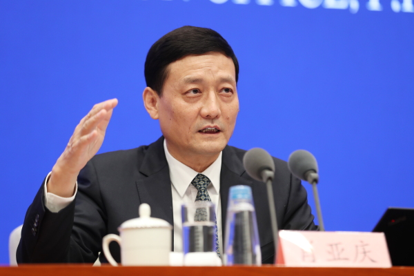 China's then-industry minister, Xiao Yaqing, attends a news conference of the State Council Information Office on March 1, 2021, in Beijing.