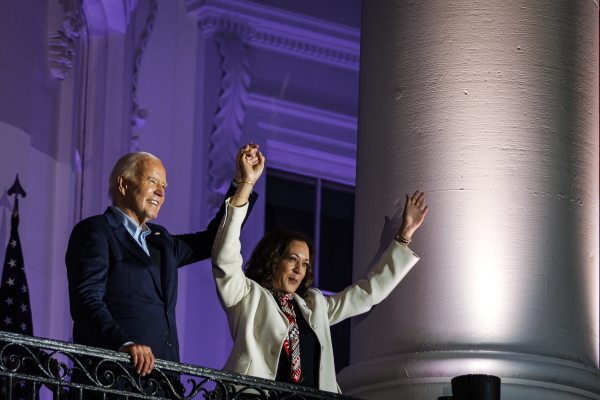 President Biden and Vice President Harris watch the fireworks on the National Mall from the White House balcony on July 4, 2024.