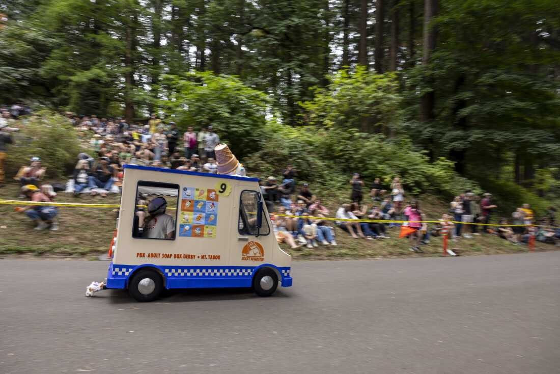 Racers a few moments after the start of the derby at Mt. Tabor Park during the 27th Portland Adult Soap Box Derby on Aug. 15 in Portland, Ore.