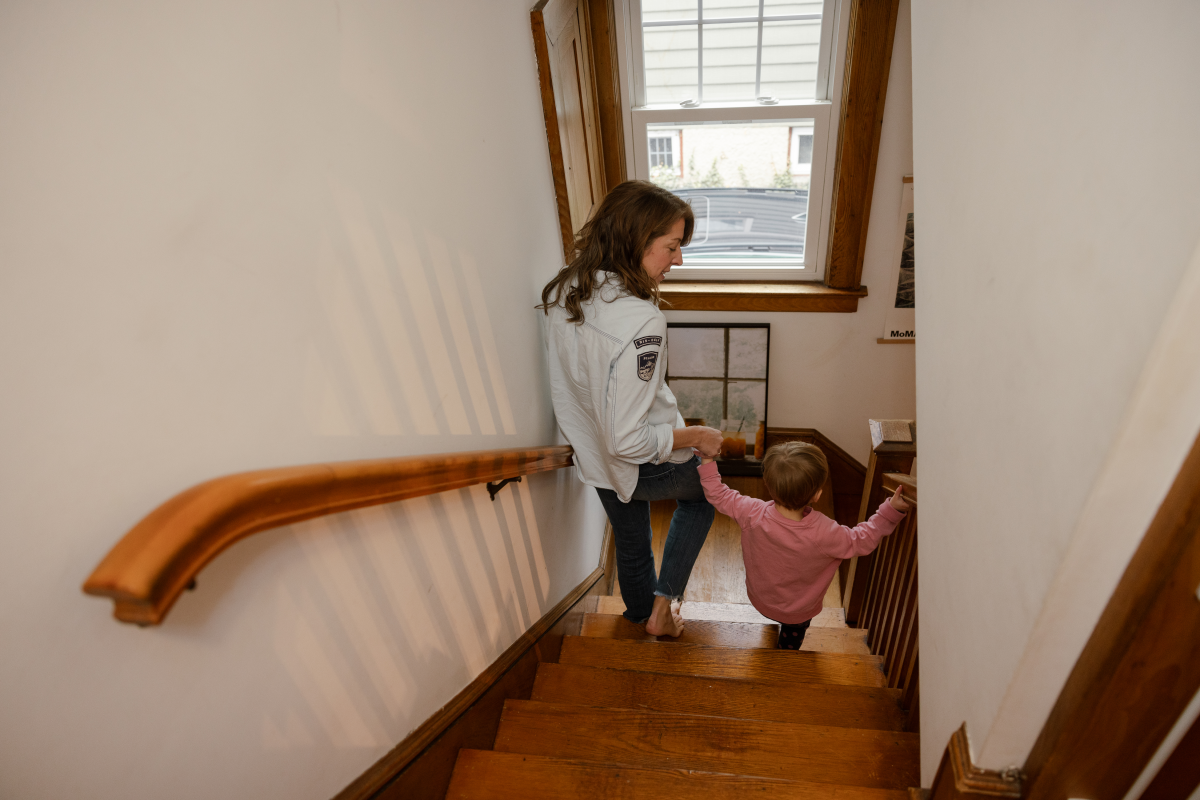 Kate Snyder and her 2-year-old daughter get ready for day care at their home in northern New Jersey. An interior designer and artist, Snyder made the decision to undergo IVF when she was in her 40s.