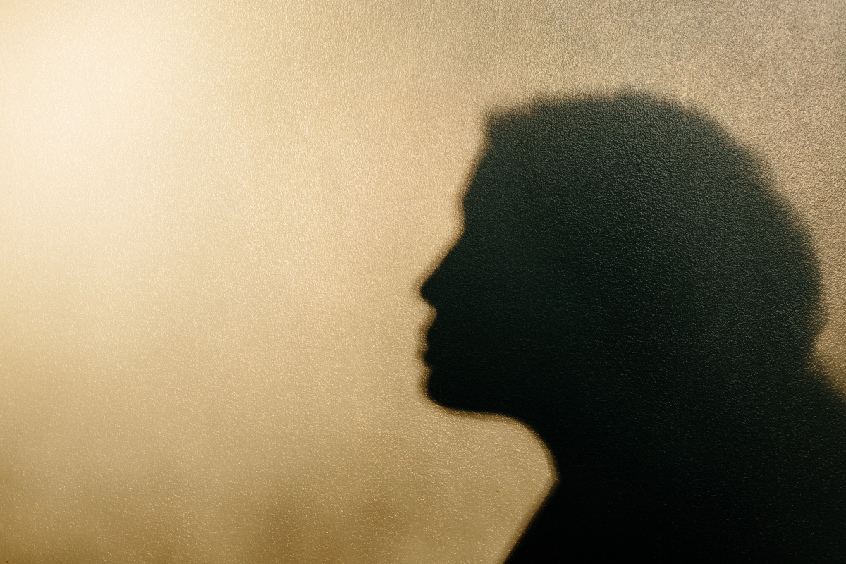 An adoptee brought to the United States by her American parents from Iran as a young child stands for a portrait in California on Feb. 21.