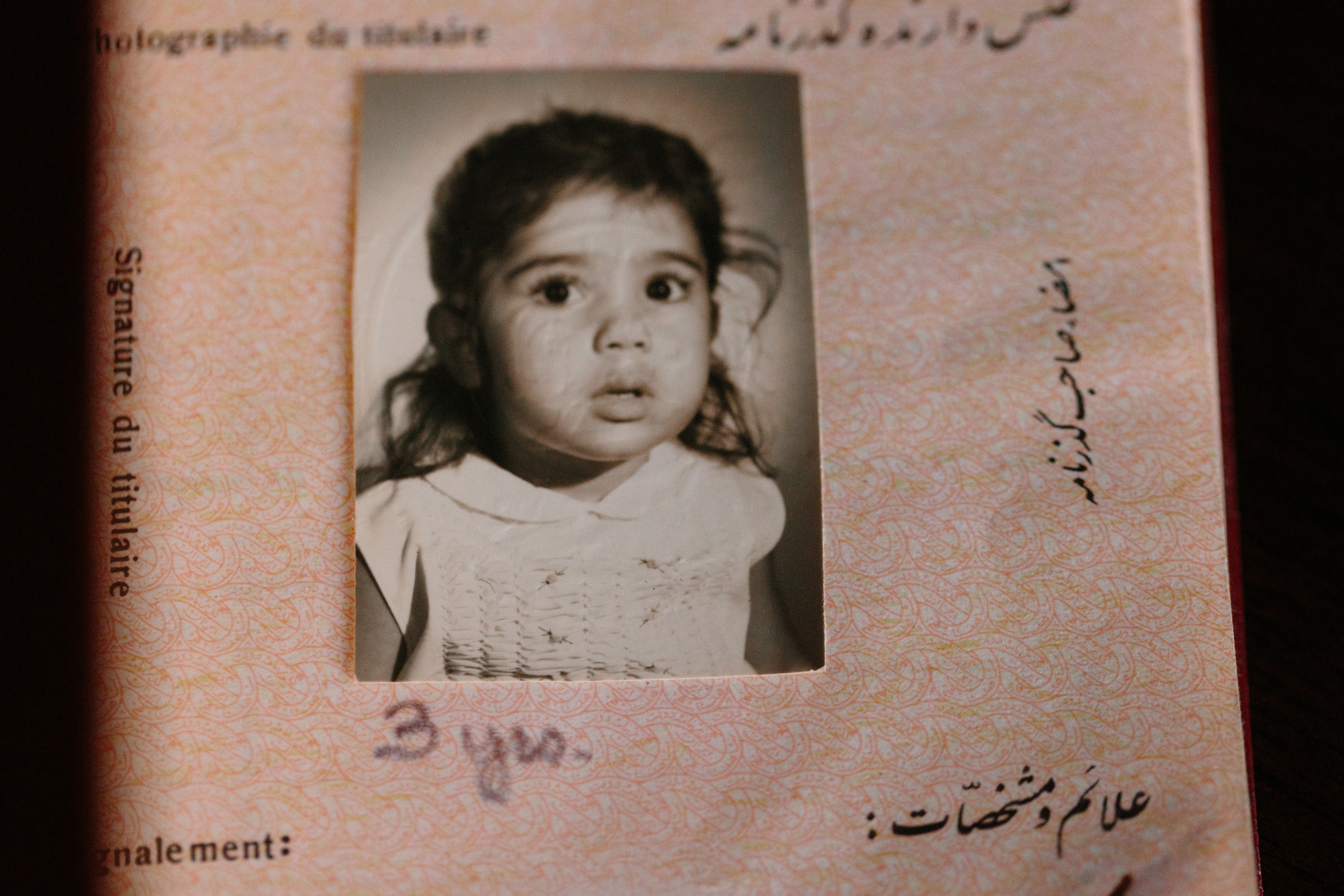 An adoptee brought to the United States by her American parents from Iran as a young child stands for a portrait in California on Feb. 21.