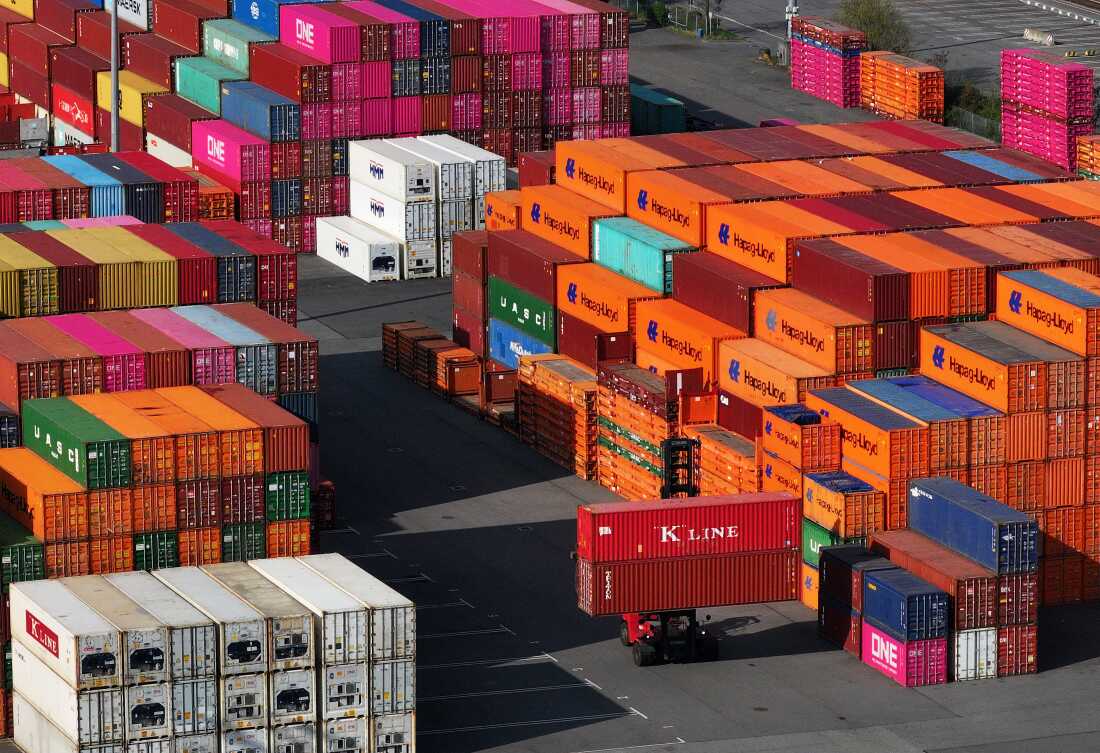 Shipping containers are stacked up in Hamburg Port in Hamburg, Germany, on April 15, 2025. Trump's tariffs is plunging the world into uncharted waters.