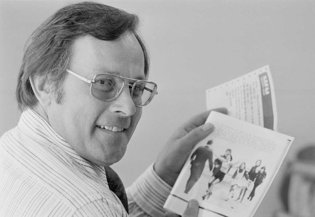 Associated Press photographer Slava "Sal" Veder holds a copy of his Pulitzer Prize-winning picture and a congratulatory telegram from Wes Gallagher, then-AP president and general manager, in San Francisco on May 7, 1974.