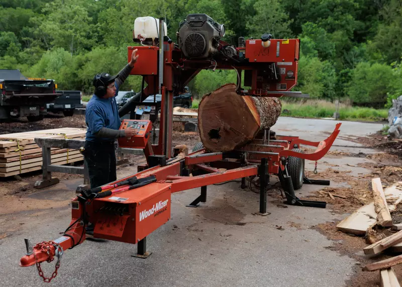 Thursday, May 21, 2026 — Saul Esparza uses a portable bandsaw mill at Camp Small, a wood waste collection yard run by the Baltimore City Department of Recreation and Parks, in Baltimore, MD.