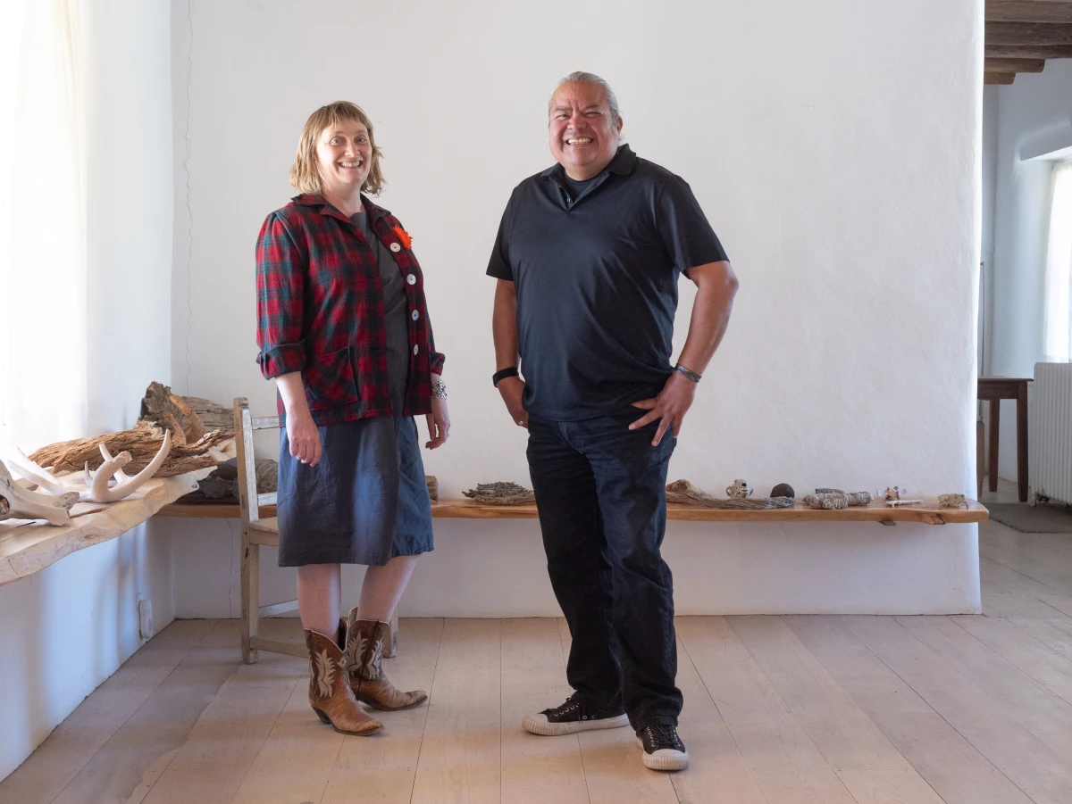 Artist Jason Garcia (Okuu Pin), of Santa Clara Pueblo (left), and Curator Bess Murphy, of the Georgia O'Keeffe Museum in Santa Fe, photographed in the studio of Georgia O'Keeffe's home at Ghost Ranch in New Mexico on March 11, 2026.