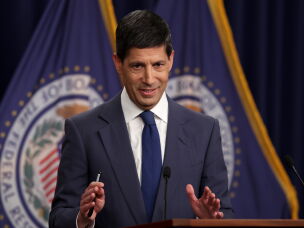 In a news conference after the Fed raised rates, Kevin Warsh called inflation