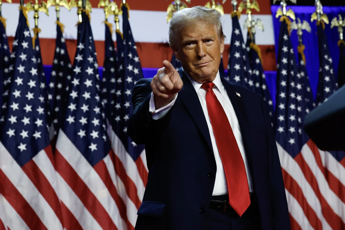 President-elect Trump addresses supporters in West Palm Beach, Fl., on Nov. 6, 2024. Economists worry that some of Trump's proposed economic policies, including tariffs on imports, could push up prices.