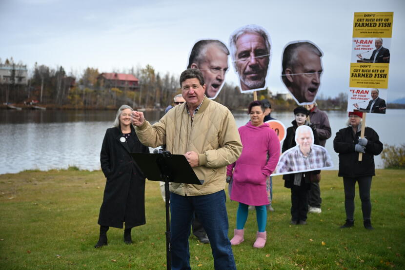 Alaska Democratic Party Chair Eric Croft talks to the crowd of protesters at Wasilla Lake.
