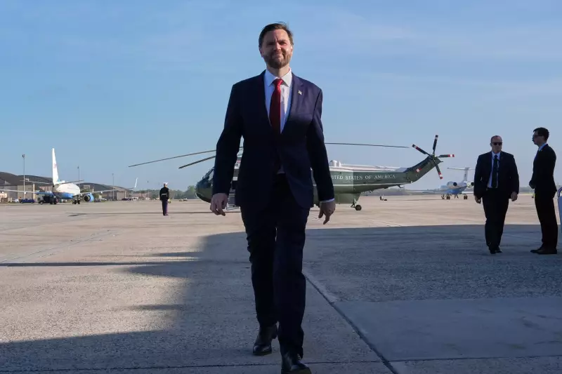 Vice President JD Vance walks to speak with the Press before boarding Air Force Two, Friday, April 10, 2026, at Joint Base Andrews, Md., for expected departure to Pakistan, for talks on Iran.
