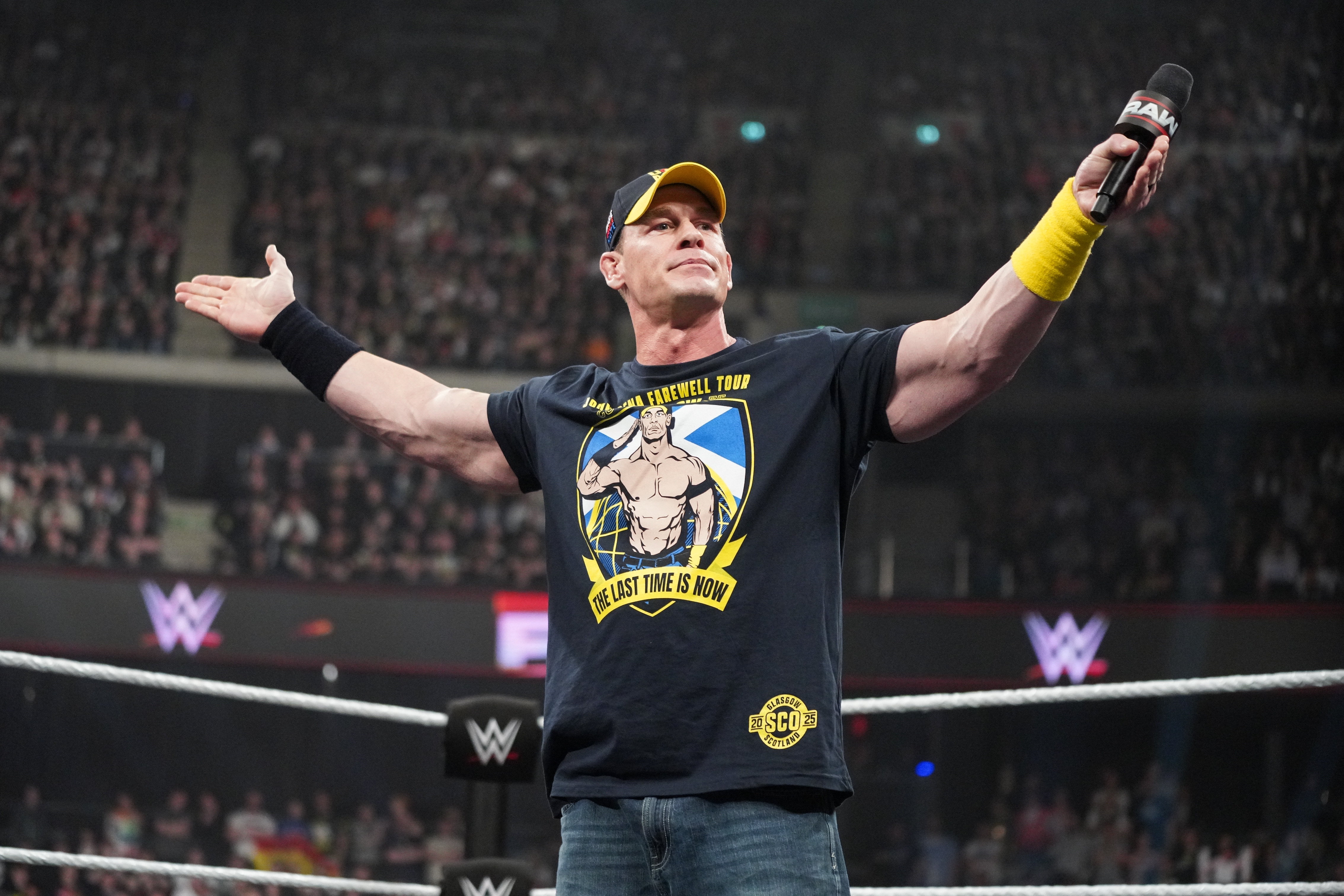 John Cena addresses the crowd during <em>Monday Night RAW</em> at The OVO Hydro on March 24 in Glasgow, Scotland.