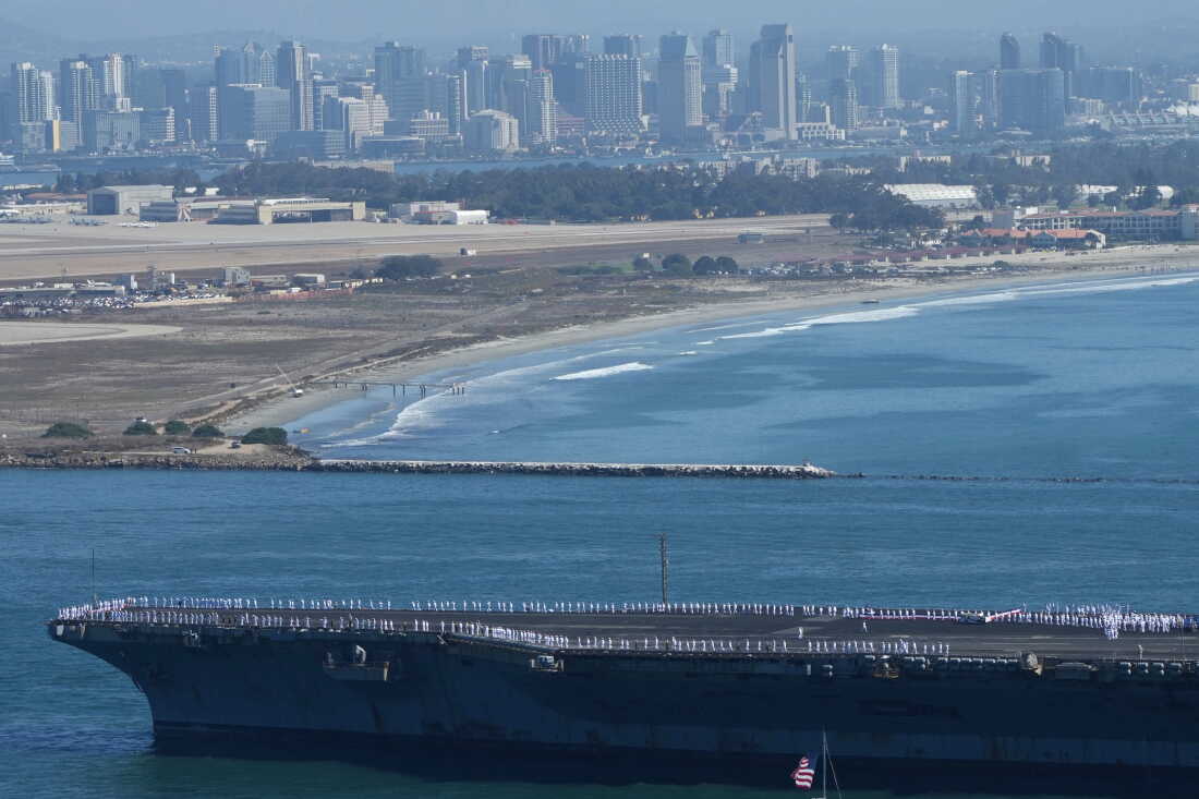 The USS Abraham Lincoln aircraft carrier returns to the San Diego Bay after deployment Thursday, Oct. 8, 2026, in San Diego.