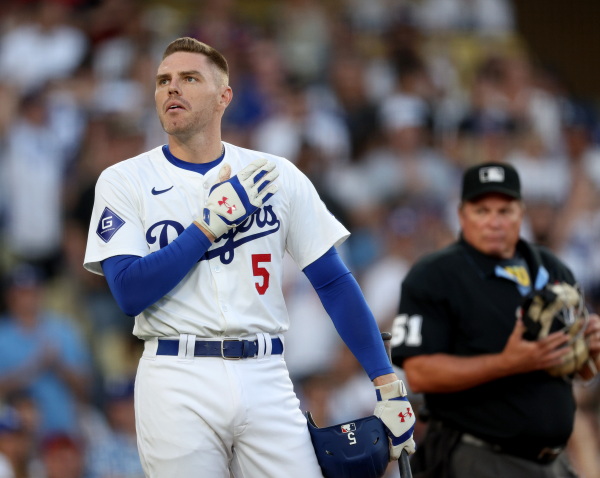 Freddie Freeman acknowledges applause from fans at the plate as he returns to the lineup on August 5, 2024 after missing games to be with his son who had been hospitalized.