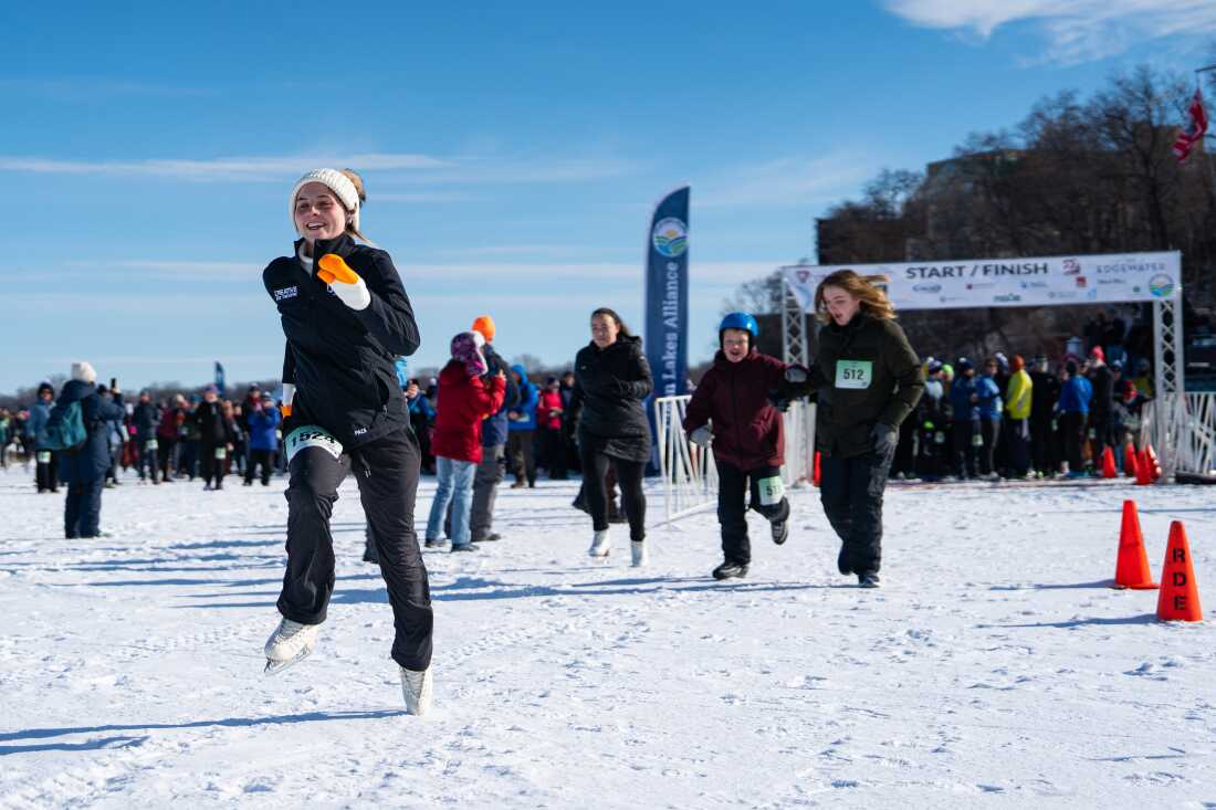 A competitor runs in ice skates during a 5k race at the Frozen Assets Festival on Lake Mendota on Saturday, Feb. 7, 2026, in Madison, Wisconsin. Photo by Kayla Wolf