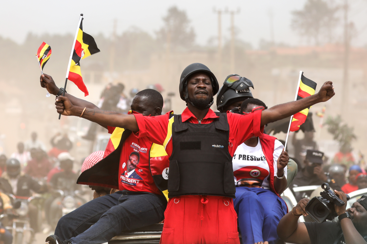 Ugandan opposition presidential candidate Robert Kyagulanyi Ssentamu, who is known as Bobi Wine, waves to supporters at an election campaign rally in Mukono, Uganda, on Jan. 9.