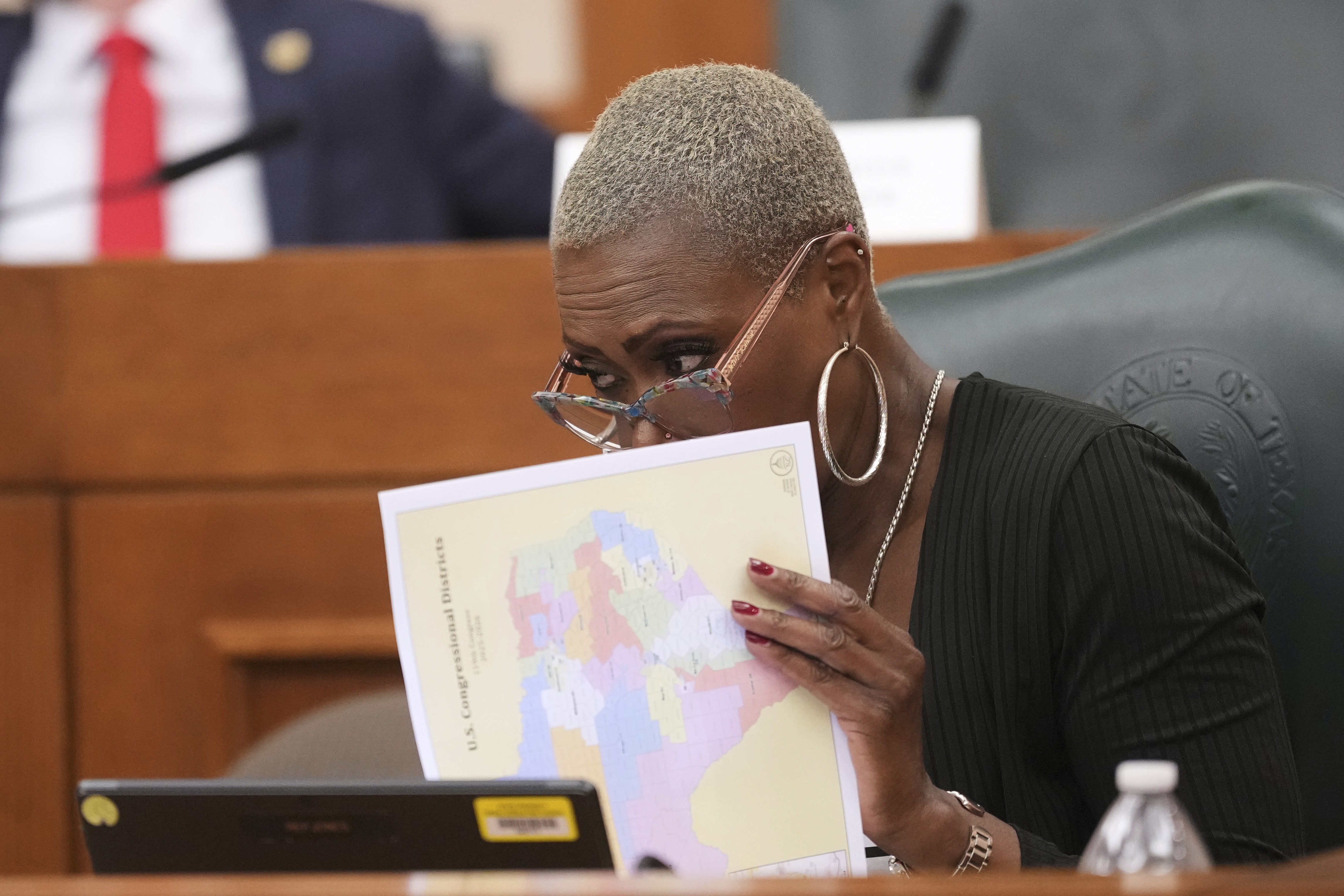 Texas state Rep. Jolanda "Jo" Jones looks through congressional maps during a redistricting hearing at the Texas Capitol in Austin on July 24. (AP)