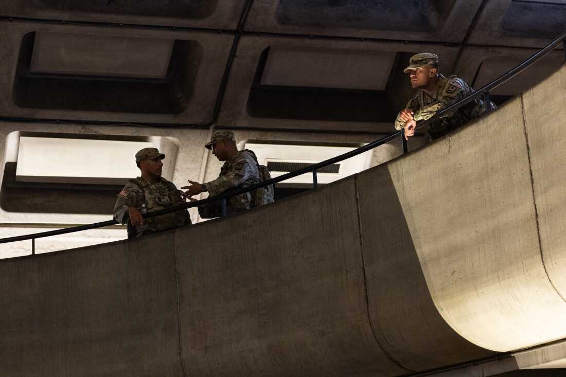 Members of the Army National Guard patrol Metro Center station during rush hour on July 08, 2026 in Washington, DC. The National Guard has been deployed in the city continuously for almost a year.