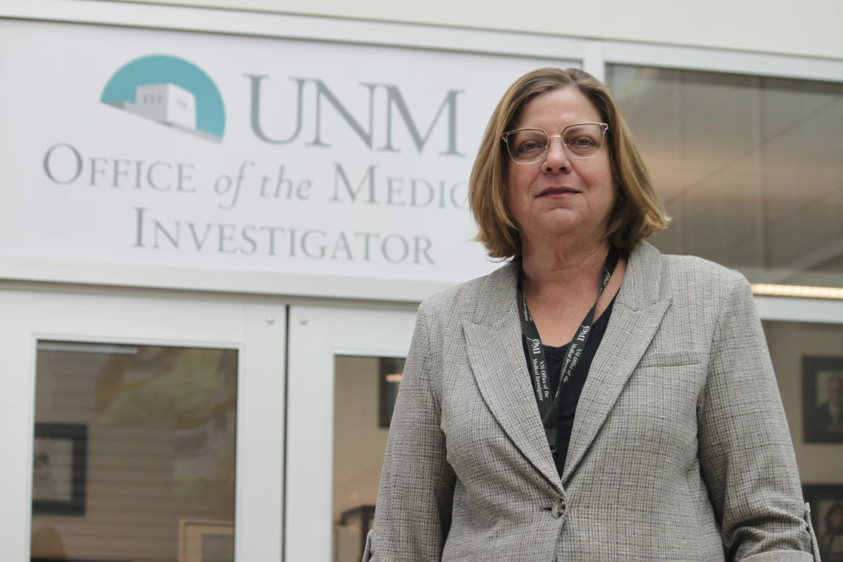 Forensic anthropologist Heather Edgar with the Office of the Medical Investigator poses for a portrait outside her office in Albuquerque, New Mexico.