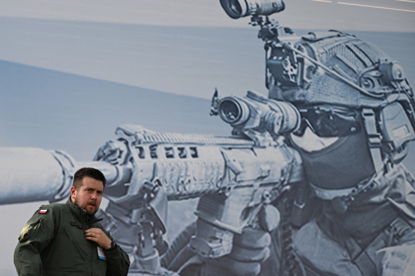 A Polish serviceman stands on an Abrams M1A1 tank during the 2024 International Defence Industry Exhibition in Kielce, Poland on September 3, 2024.