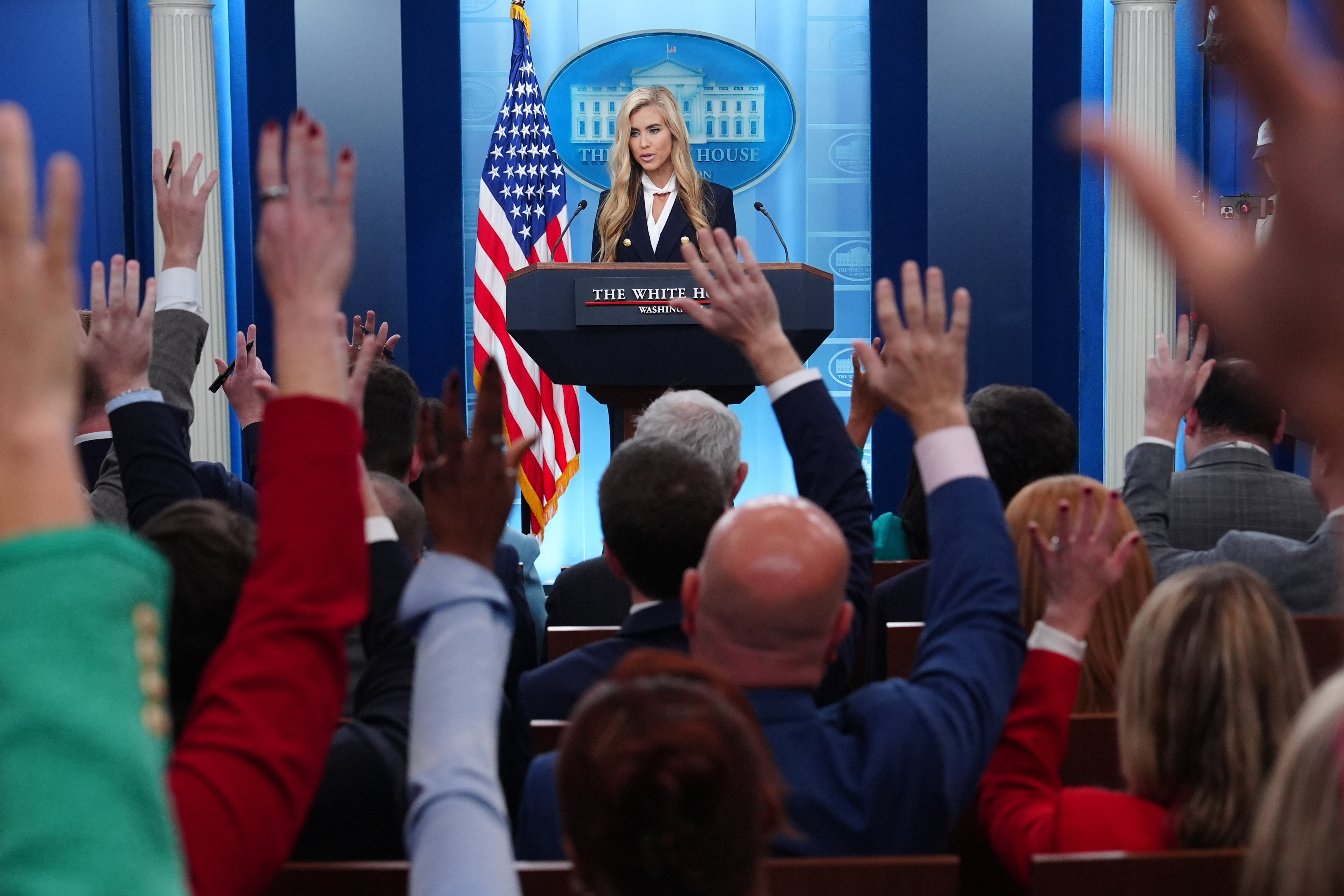 New White House press secretary faces questions about credentials after first briefing