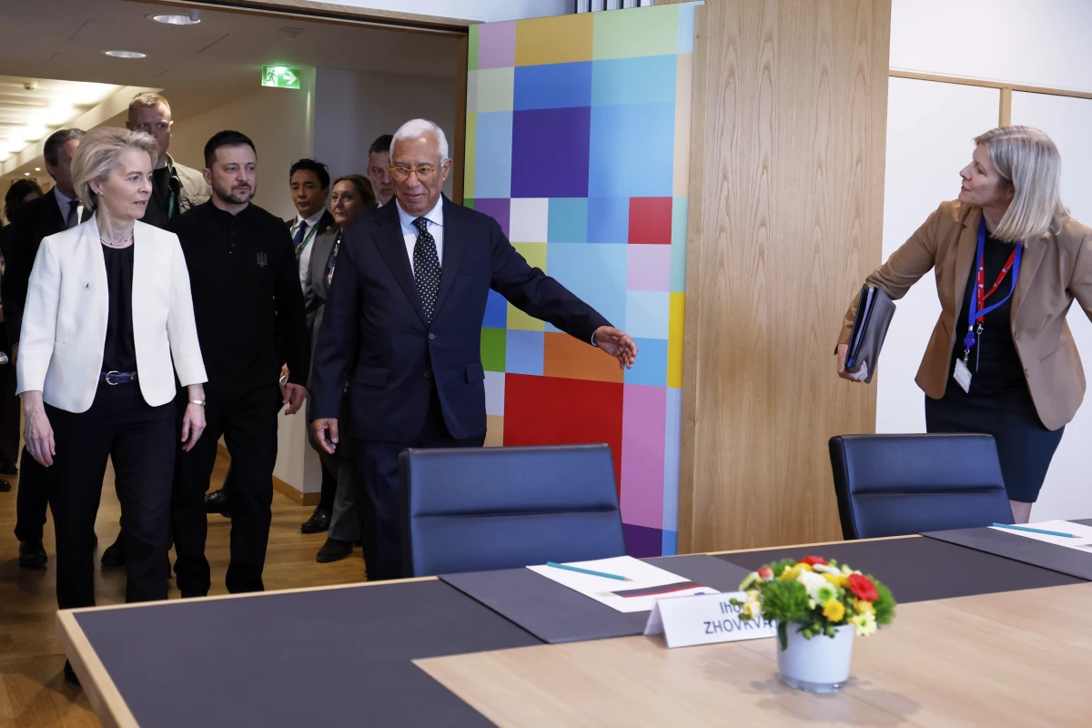 European Commission President Ursula von der Leyen, left, Ukraine President Volodymyr Zelenskyy, center, and European Council President Antonio Costa, center right, and  arrive for a round table meeting at an EU Summit in Brussels on Thursday.