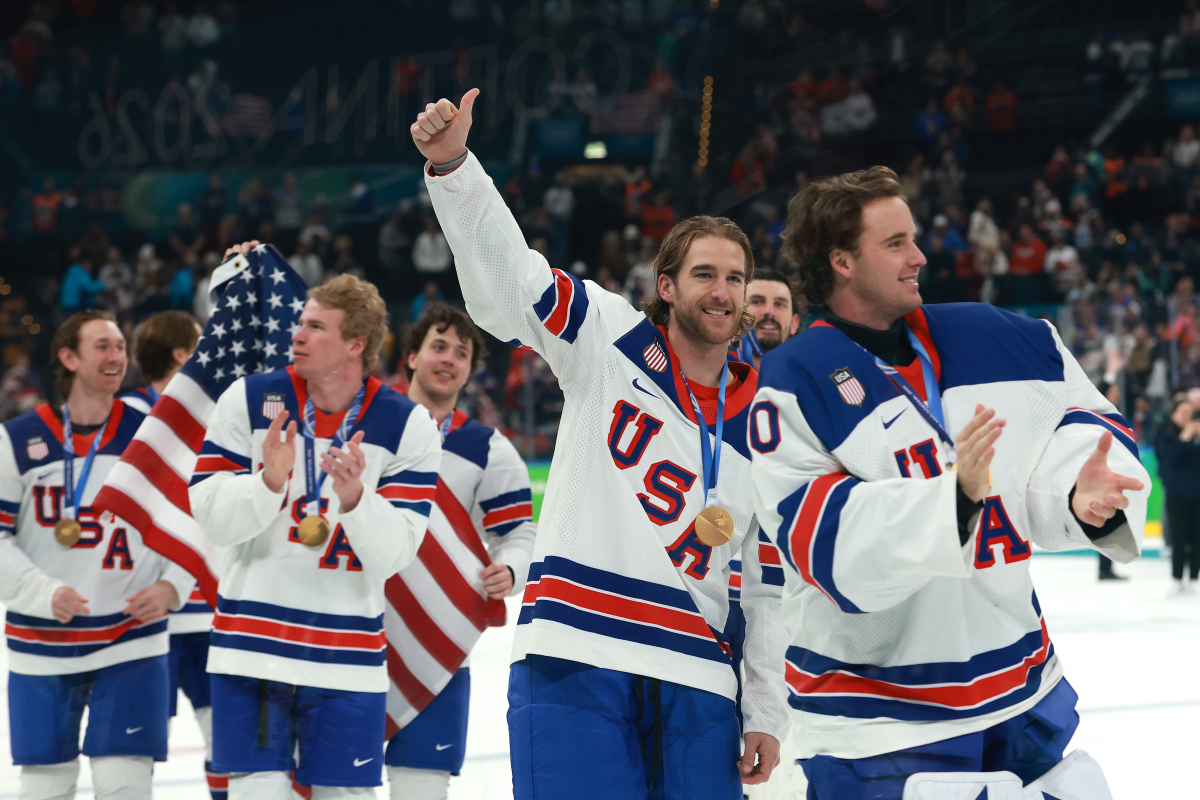 The U.S. hockey team celebrates winning the gold medal match against Canada on Saturday.