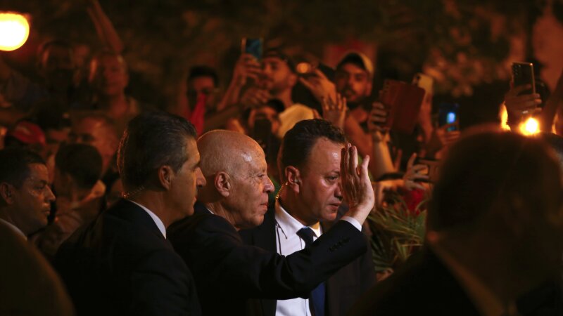 Tunisian president and candidate for re-election Kais Saied joins his supporters after the announcement of the provisional results for the presidential elections, in the capital Tunis, Tunisia, Sunday.