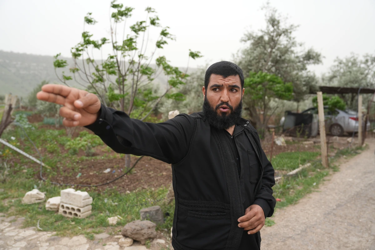 Abdul Rahman Hamdan, 32, recounts how his uncle was killed by Israeli troops who attacked their village of Koayiah, Syria.