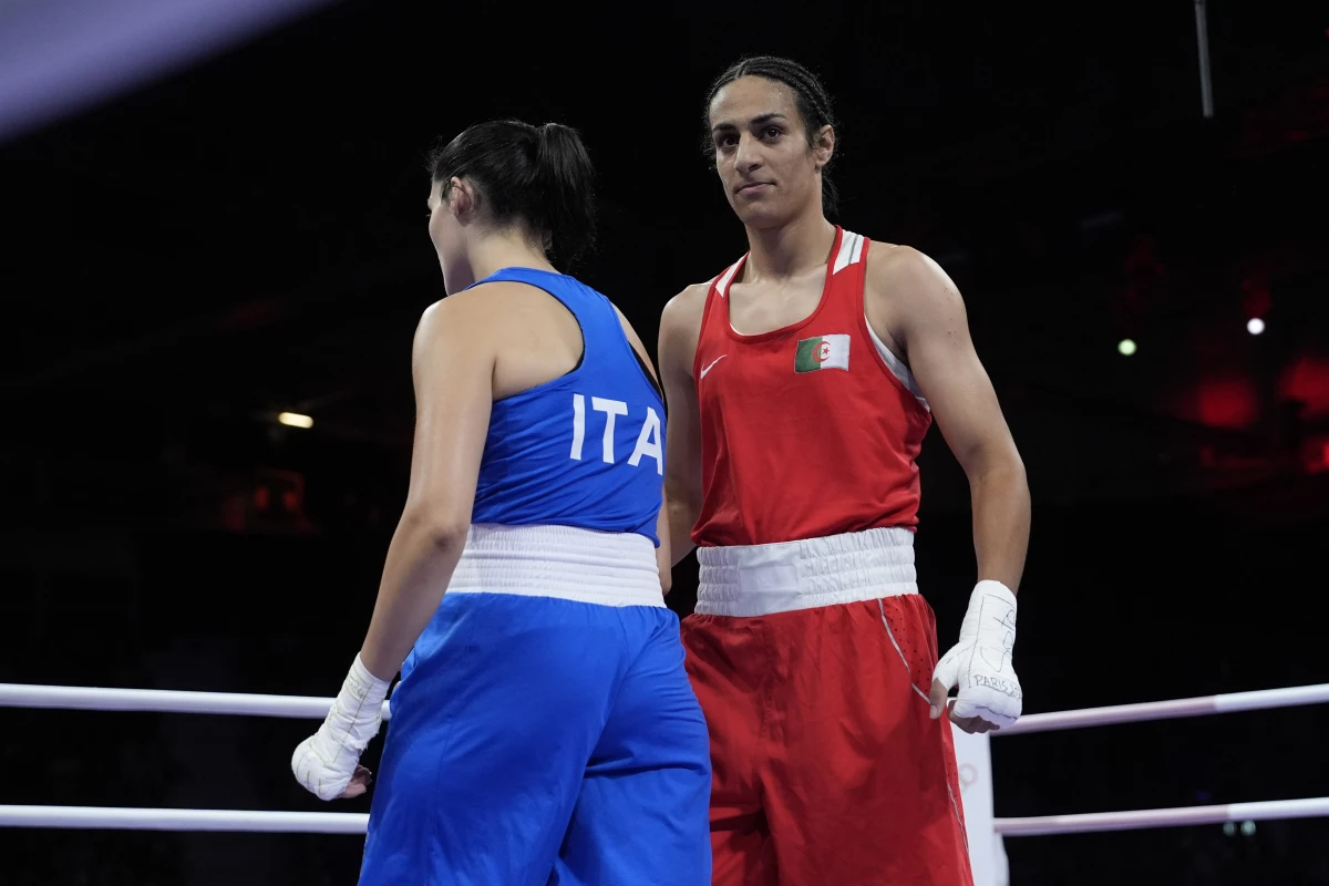 Algeria's Imane Khelif, right, walks beside Italy's Angela Carini after winning their women's 66kg preliminary boxing match on Thursday.