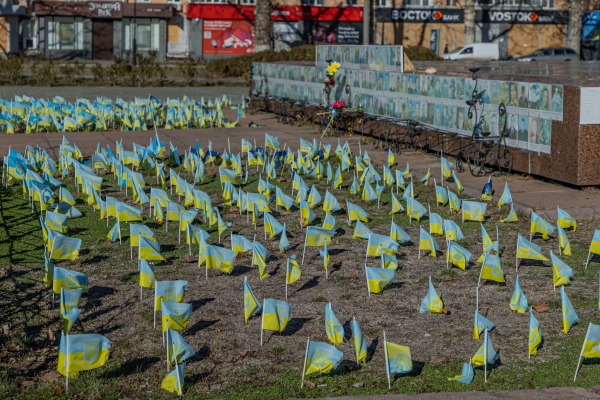 Ukrainian flags in the name of fallen Ukrainian fighters in front of the Kherson regional city administration.