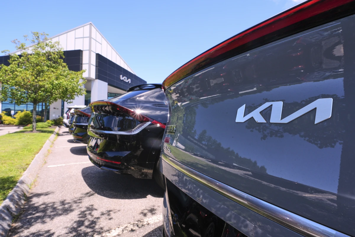 A selection of Kia EV6 sedans, which are fully electric vehicles, are displayed at a dealership, Friday, July 18, 2025, in Manchester, N.H.