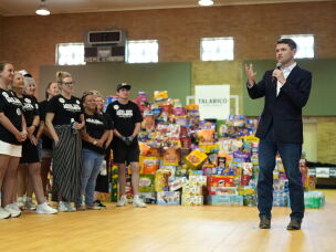 Democratic U.S. Senate candidate Texas state Rep. James Talarico speaks at a food drive at the Frederick Douglass Human Services and Justice Center.