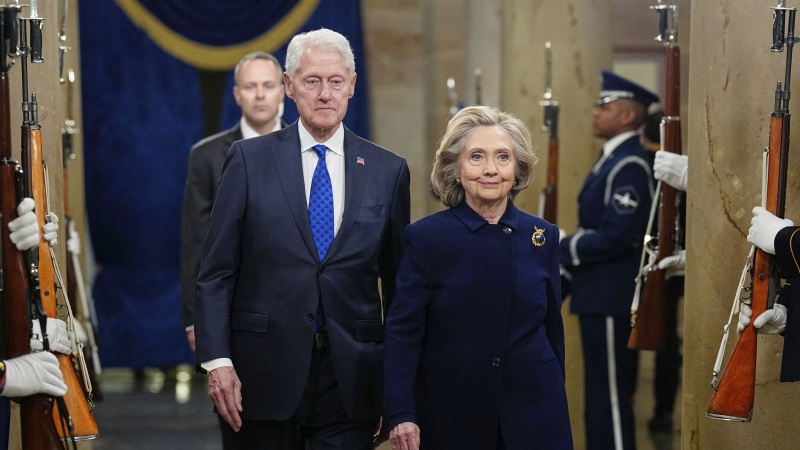 Former President Bill Clinton and former Secretary of State Hillary Clinton arrive for the inauguration in the rotunda of the U.S. Capitol on Jan. 20, 2025. House Republicans are seeking testimony from the Clintons about their past ties with Jeffrey Epstein.