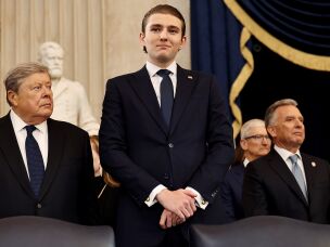 Barron Trump arrives at his father's inauguration in the Rotunda of the U.S. Capitol on Jan. 20, 2025, in Washington, D.C.