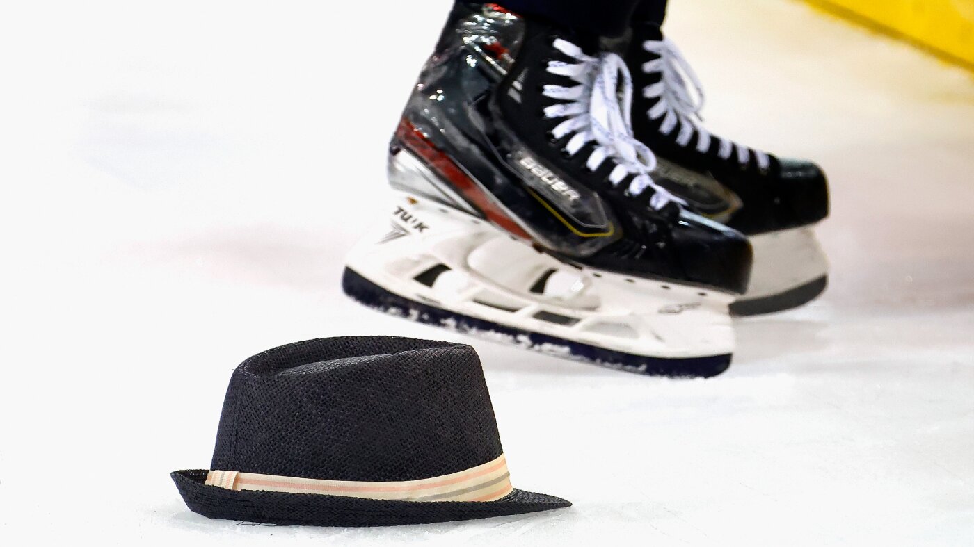 From gifting a hat to tossing them onto the rink, a history of hat tricks in sports