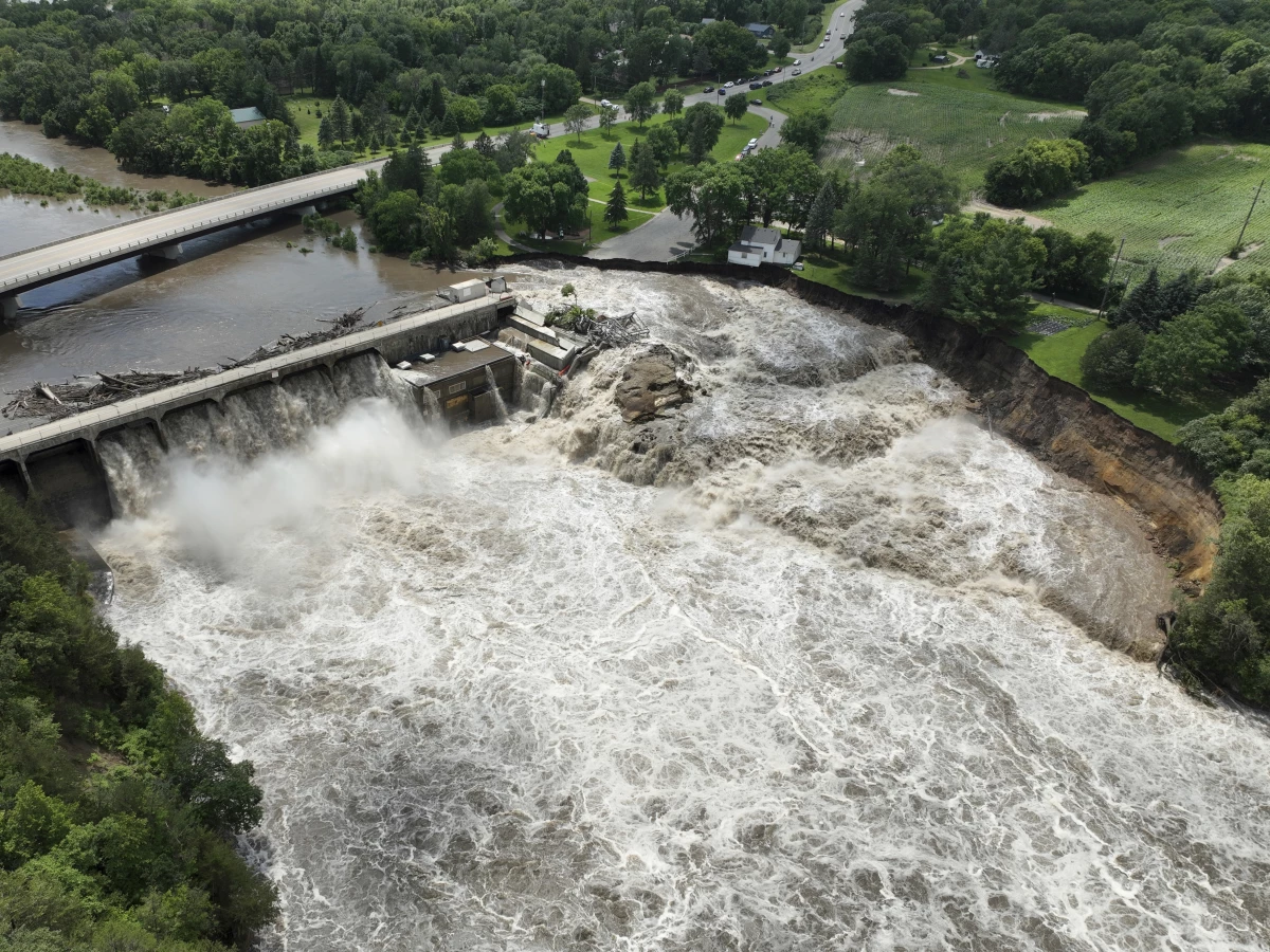 Heavy rains cause high water levels at the Rapidan Dam near Mankato, Minn., on Monday, June 24, 2024. Officials say the dam is threatened with “imminent failure.”