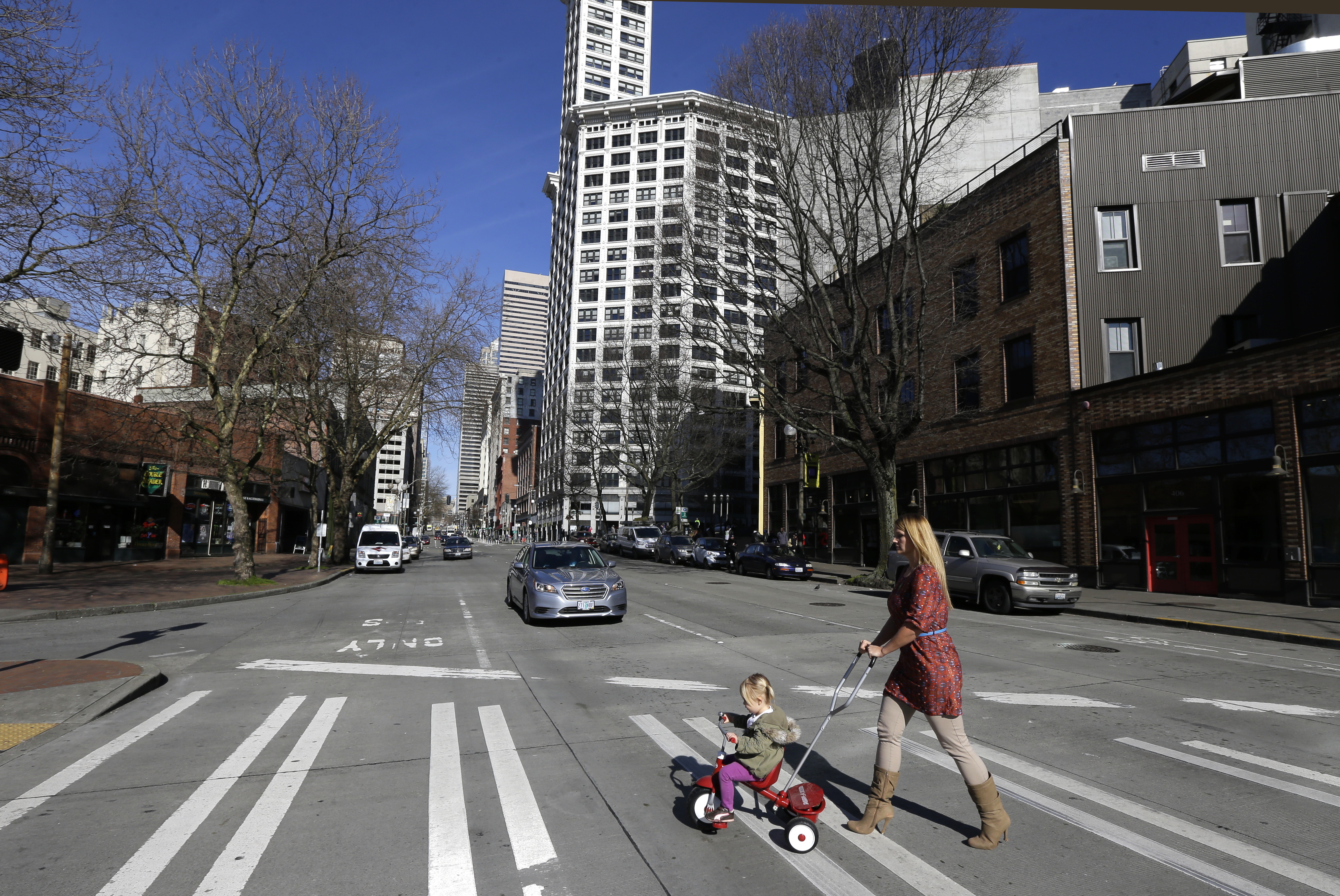 Mom and kid cross street