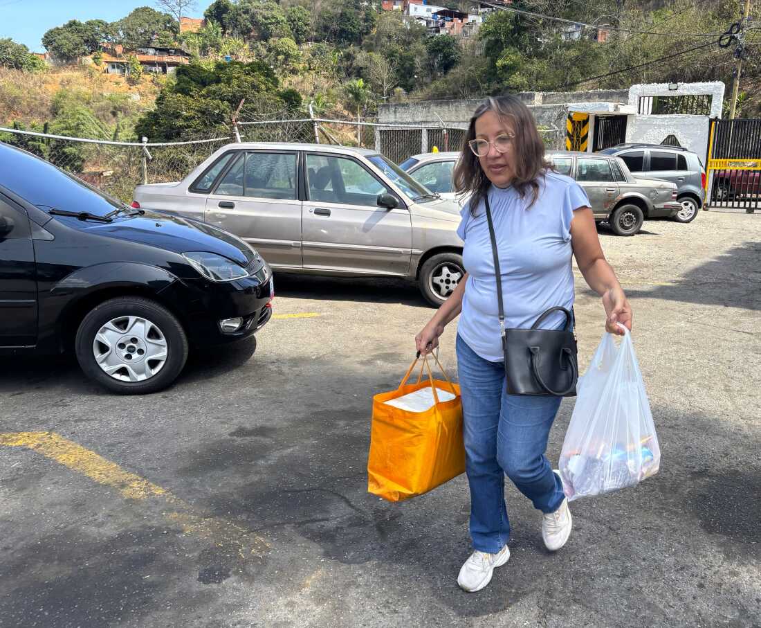 Nelly Padilla, a public school teacher, sells ice creams to her neighbors, to supplement her monthly wages of $160.