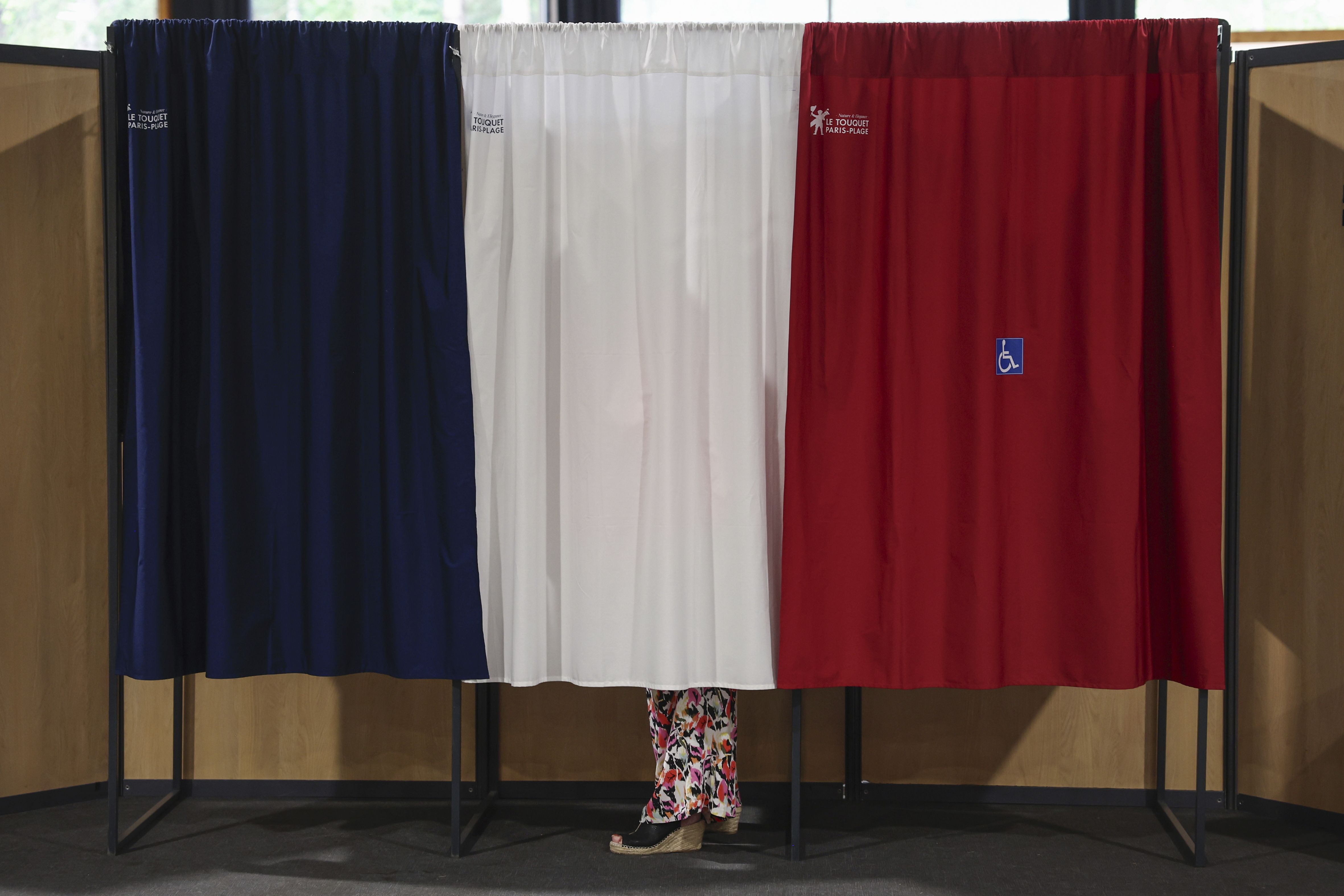 French left coalition comes out on top in elections, in shock upset over the far right