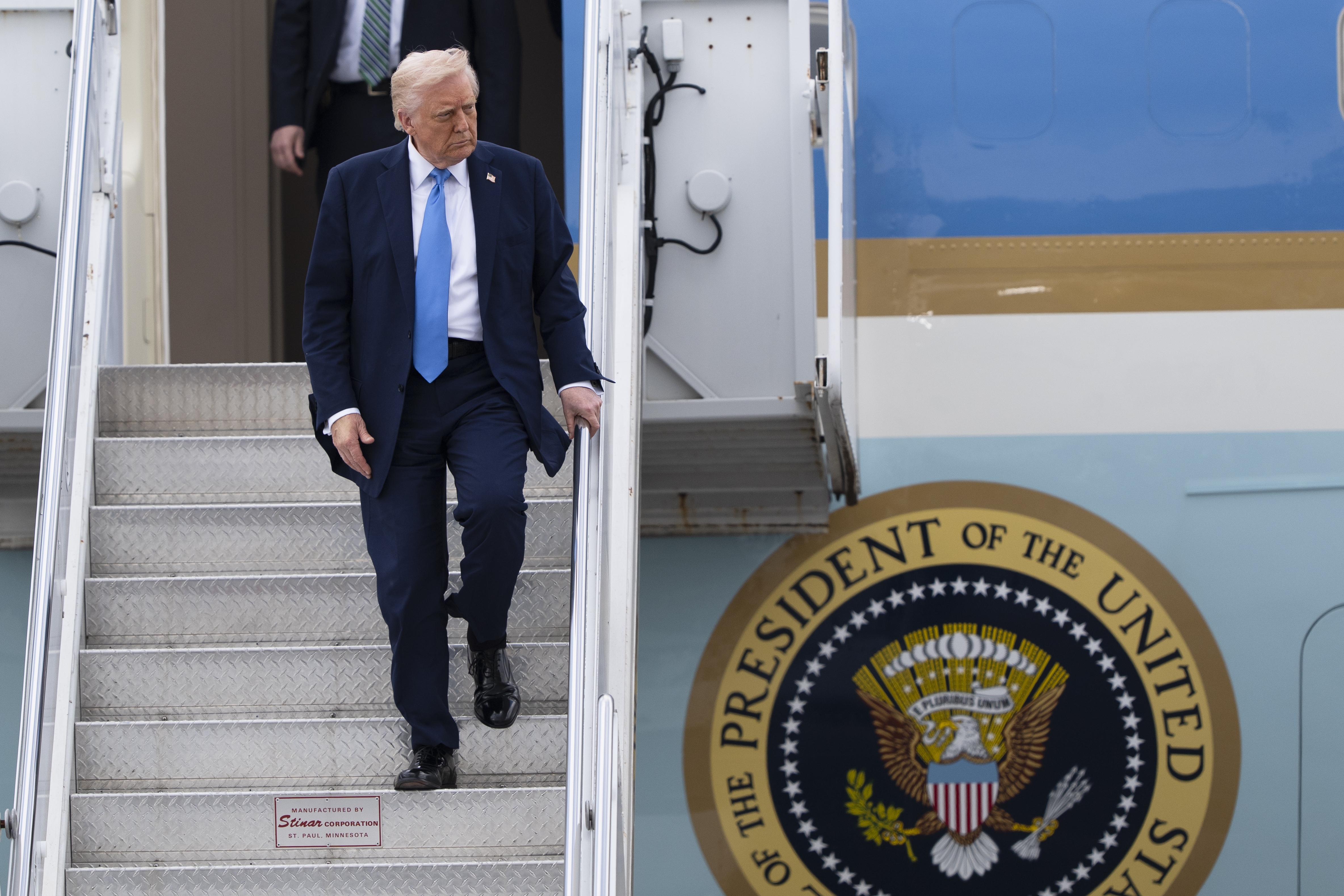 President Trump arrives at Palm Beach International Airport in West Palm Beach, Fla., on Friday aboard Air Force One. (AP)