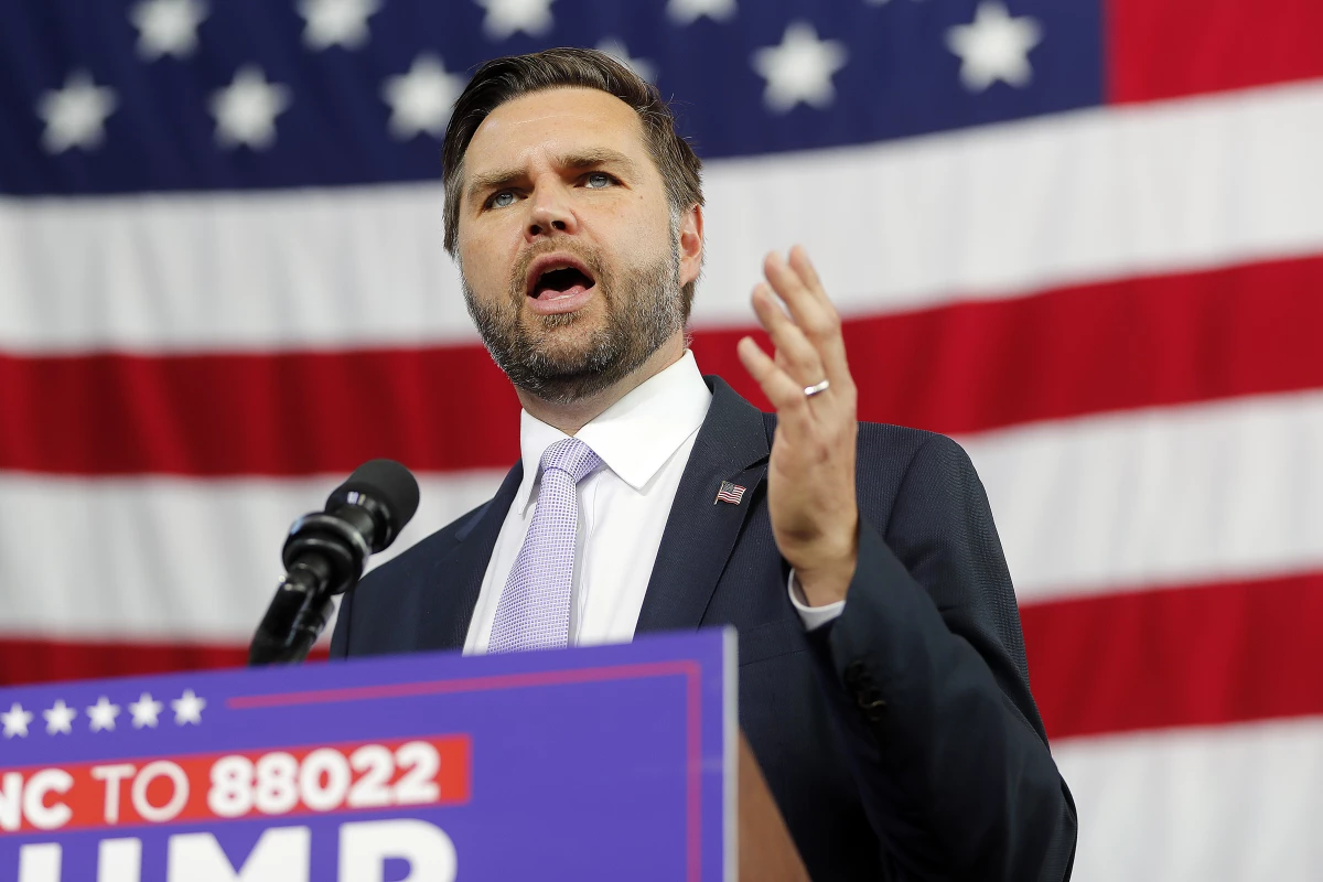 Republican vice presidential nominee Sen. JD Vance, R-Ohio, speaks at a campaign event in Raleigh, N.C., Wednesday. At the event, he continued to criticize migrants from Haiti, saying those with Temporary Protected Status (TPS) or other authorized immigration status are 'illegal aliens' who should be deported.