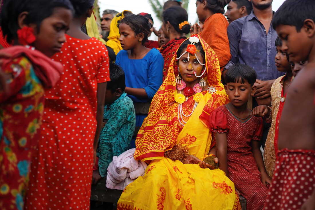Although India has laws forbidding child marriage, there are many thousands of child marriages each year. Pictured: A 14-year-old on her wedding day.