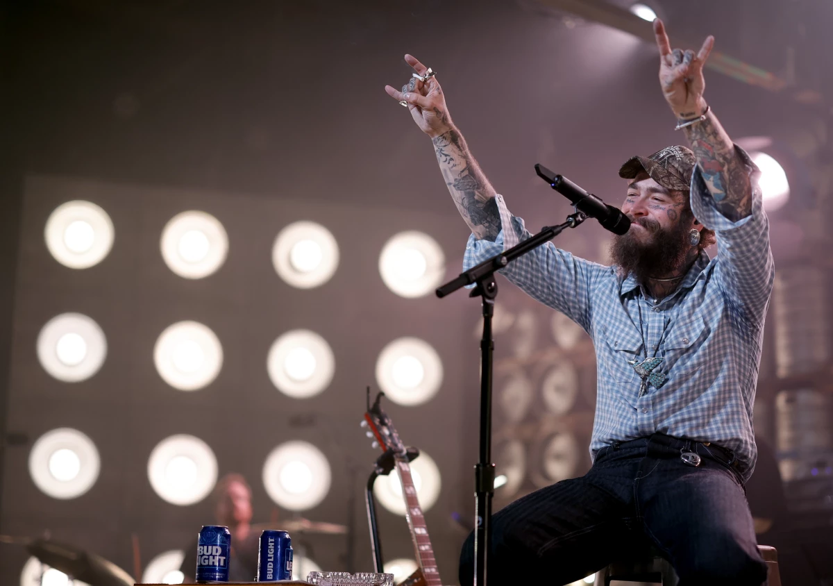 Post Malone, who has spent the year shifting his focus from hip-hop and pop toward country music (scoring a No. 1 single in the process) performs on July 16, 2024 in Nashville, Tenn. His first all-country album, F-1 Trillion, topped this week's Billboard album chart.
