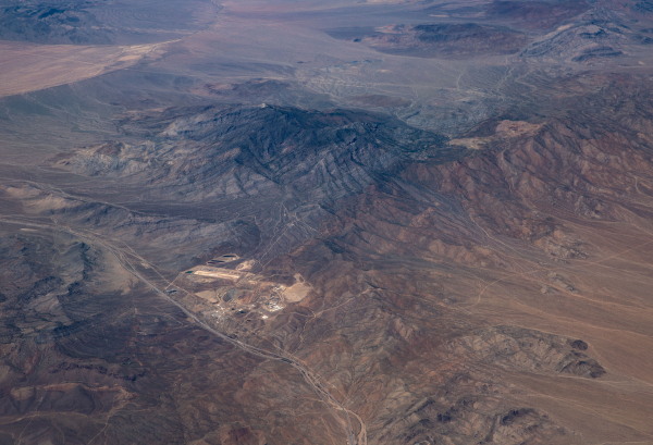 The Mountain Pass rare earth mine and processing facility, owned by MP Materials, is viewed from an airplane flying at 37,000 feet on Sept. 1, 2023, in Mountain Pass, Calif.